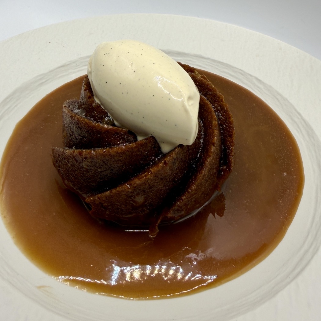 Sticky toffee pudding with vanilla ice cream